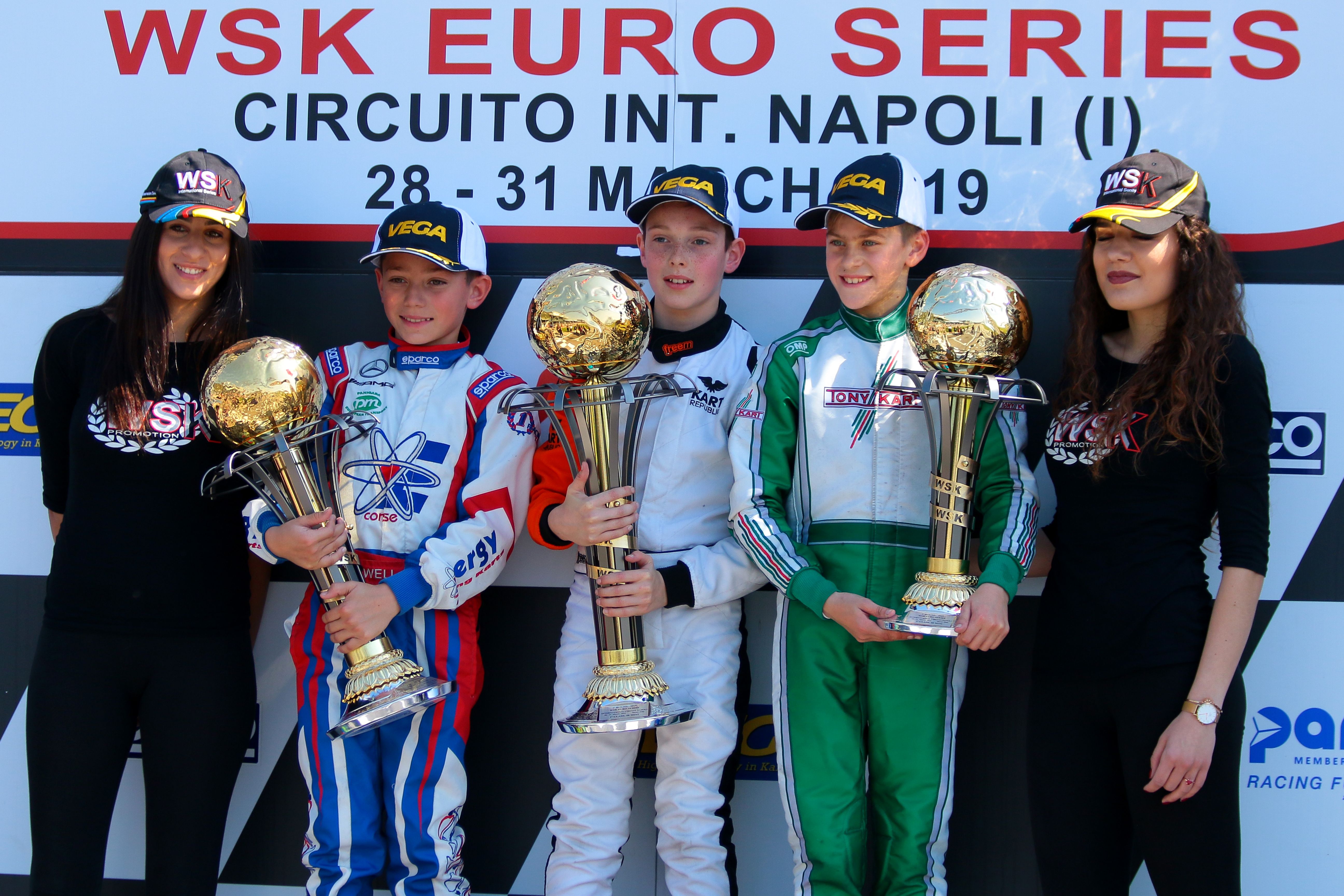 William MacIntyre from Kart Republic (Parolin/TM Racing/Vega) is the winner in the WSK Euro Series at Sarno. Alongside, Alex Powell from Energy and Andrea Filaferro from Newman