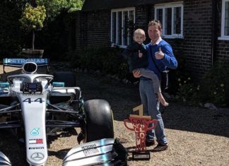 Harry Shaw with Lewis Hamilton Mercedes F1 car